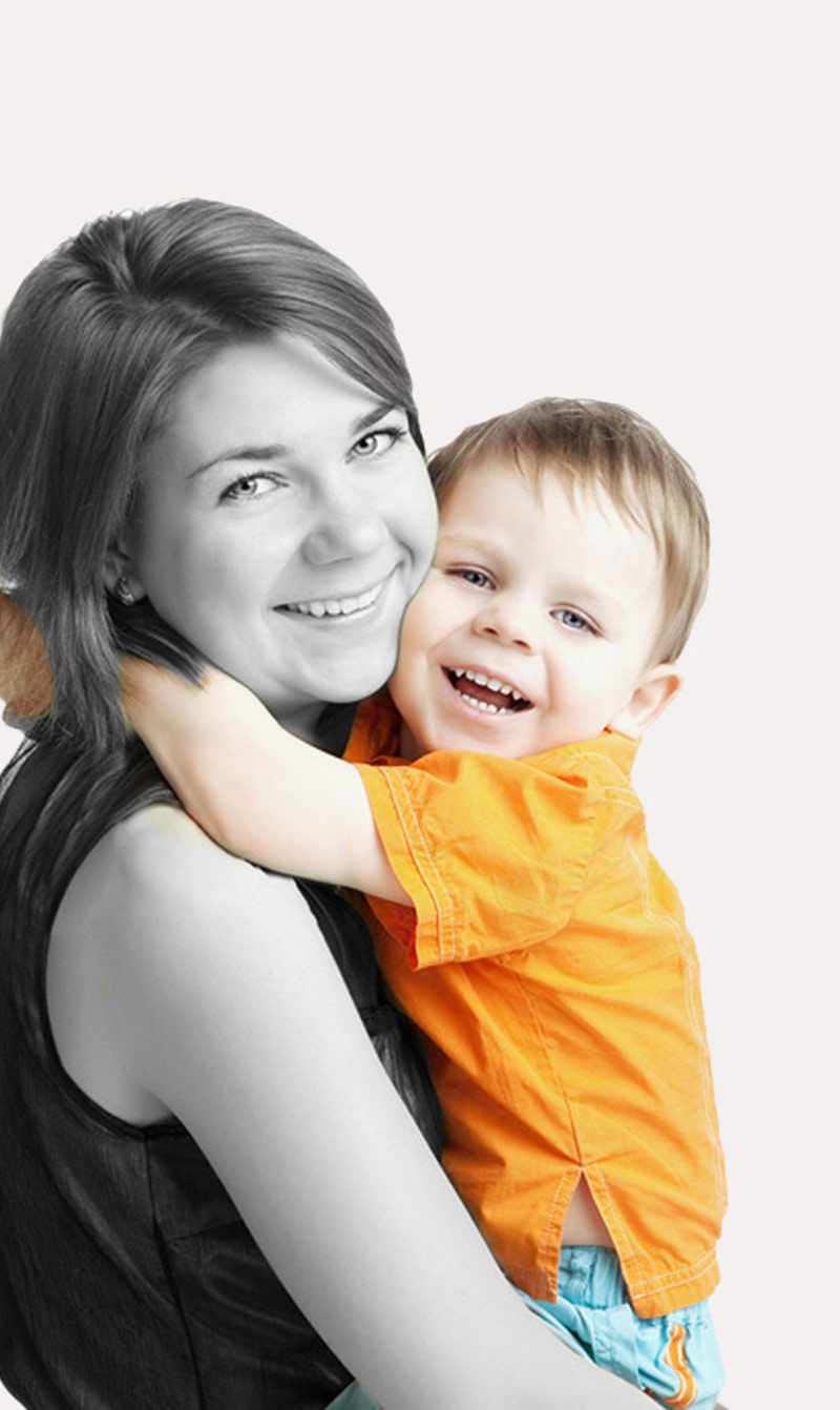 mom holding son